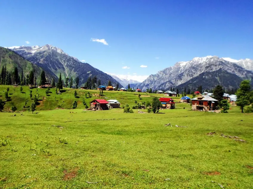 Traditional wooden houses in Kel village nestled in the green hills of Neelum Valley, Azad Kashmir