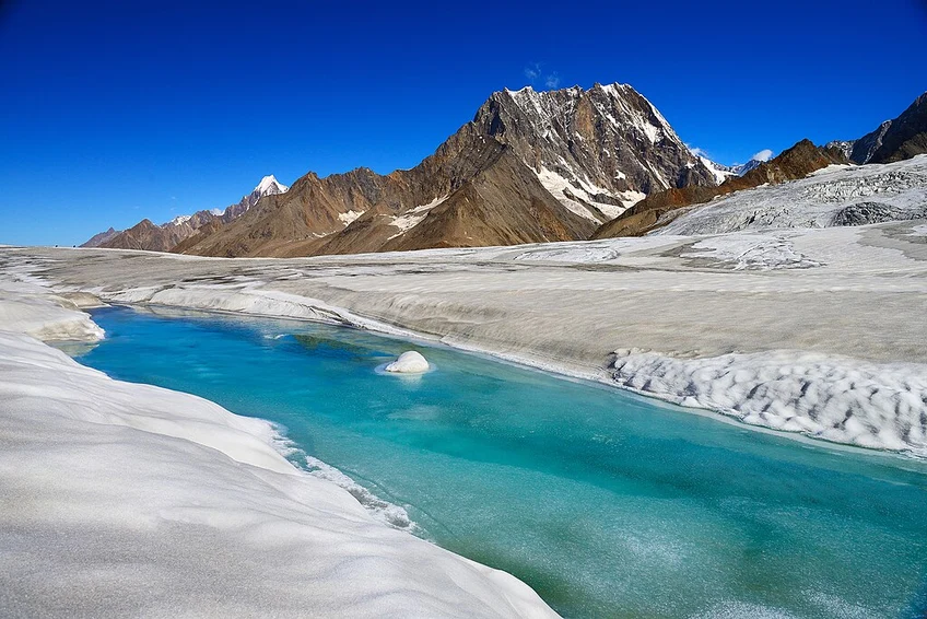 A glacial stream flowing across the Hispar Glacier in the Karakoram Mountains, Pakistan