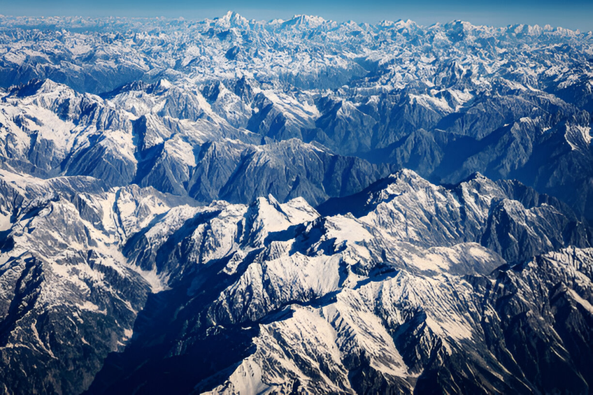 aerial-view-swat-valley-tirich-mir-central-asia-pakistan Aerial view of Swat Valley with Tirich Mir in the distance – showcasing the majestic mountains of Central Asia in Northern Pakistan