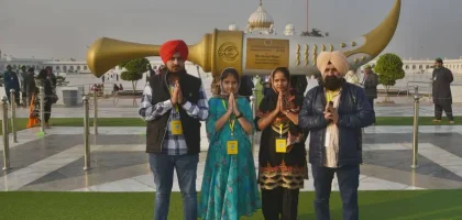 Large group of Sikh pilgrims gathered at Gurdwara Janam Asthan for a major religious ceremony.