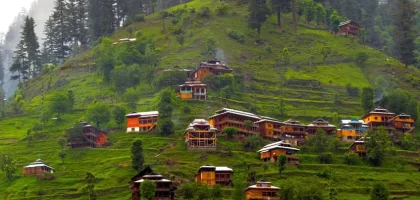 Panoramic view of Sharda town with the Neelum River and forested mountains in Azad Kashmi
