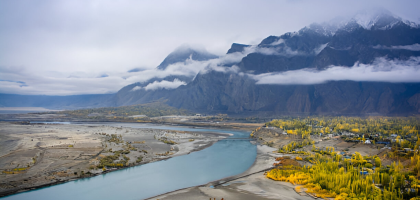 Fascinating view of a Skardu village along the riverbank in the Karakoram Mountains, Gilgit Baltistan, Pakistan