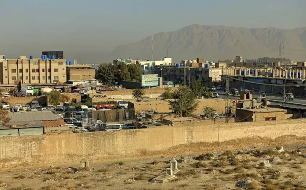 Aerial view of Ziarat and Quetta cities in Balochistan, Pakistan, nestled amidst mountainous landscapes."